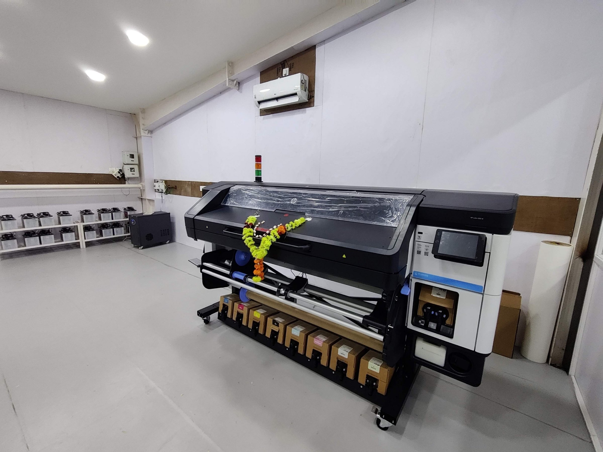 Large-format latex roll printer in the print room