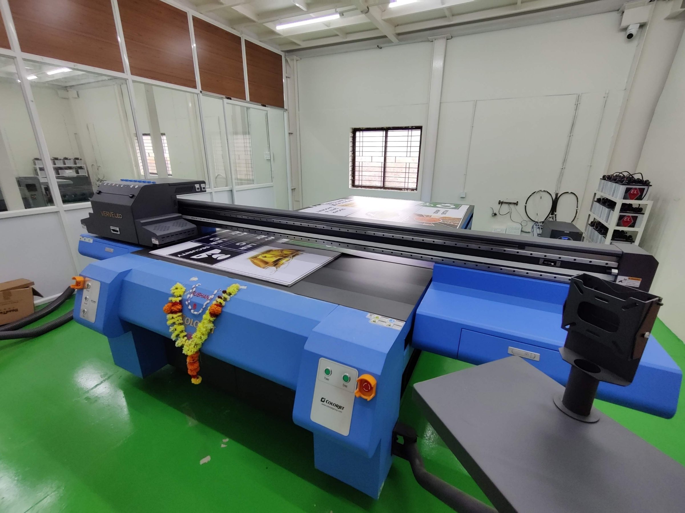 UV flatbed printer on the green-floor print bay
