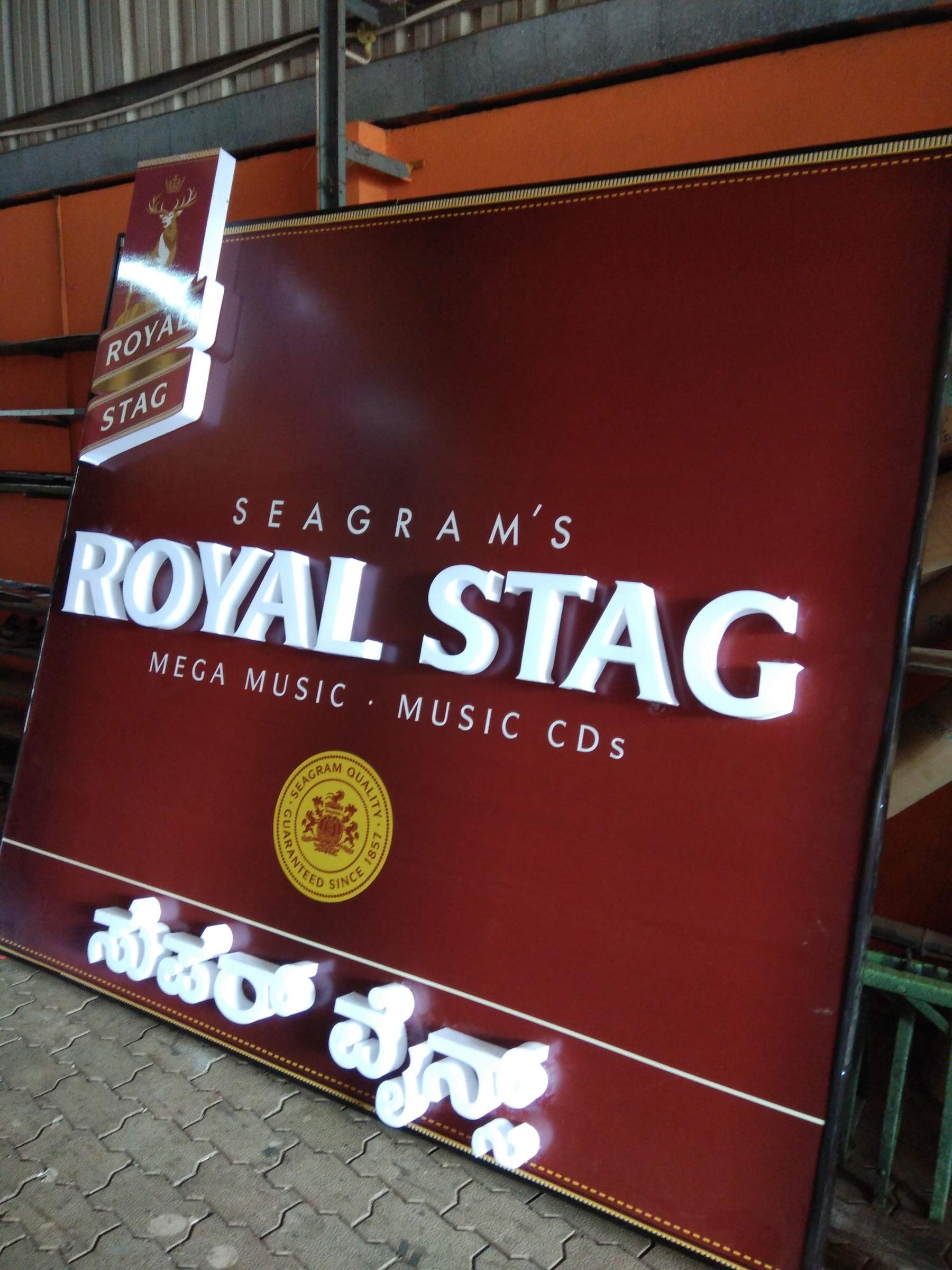 Lit Royal Stag sign board with raised letters, finished in the workshop
